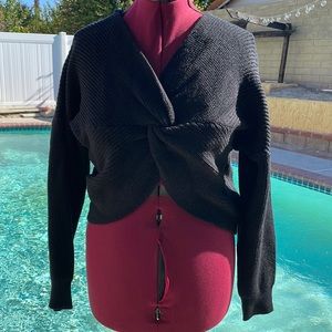 Cropped off shoulder sweater